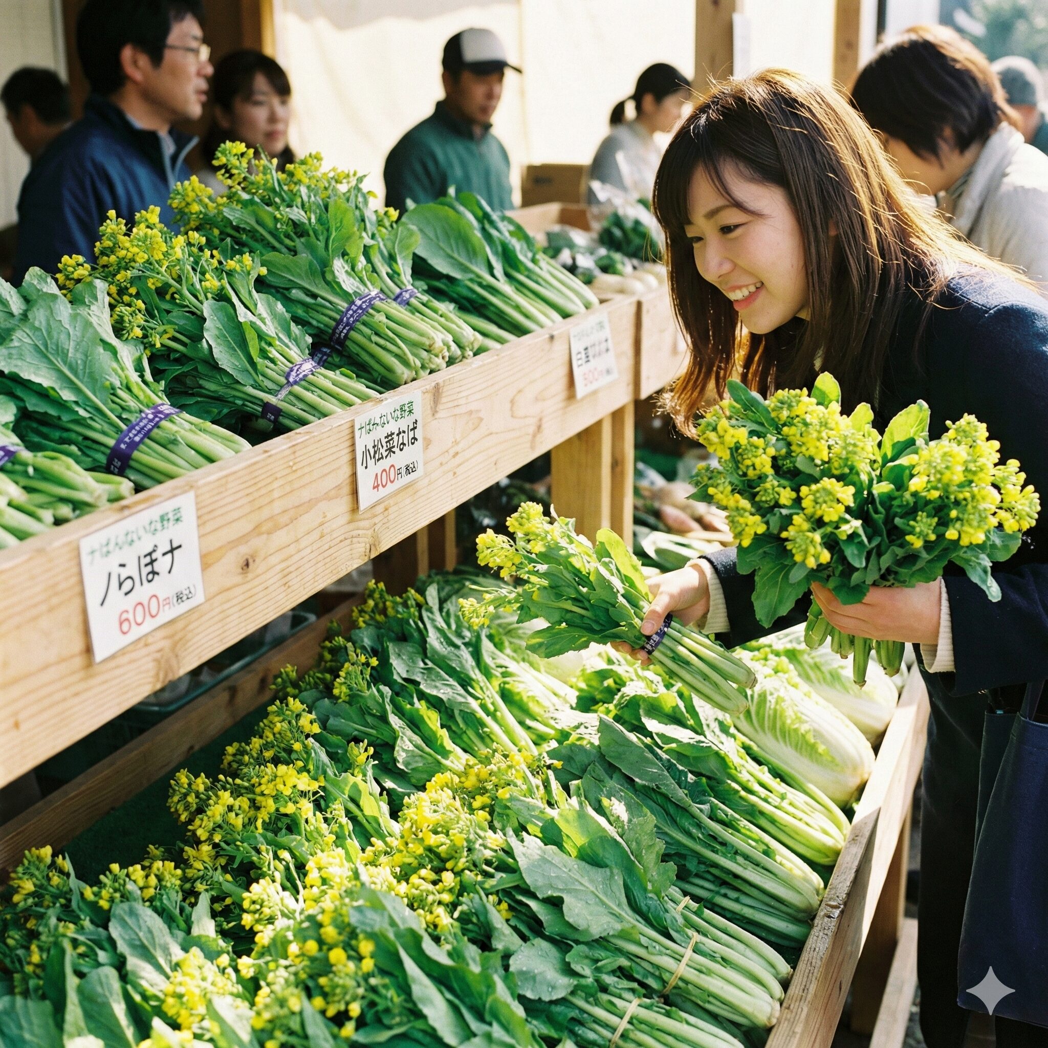 菜の花に似た野菜1　春の直売所に並ぶ、のらぼう菜や小松菜の菜花など多様な種類の菜の花の束
